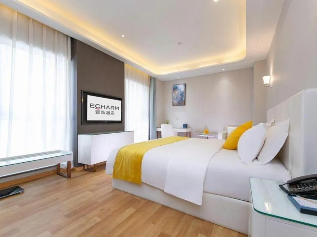 Bed in Echarm Hotel Wuhan Wusheng Road Metro Station Cade Square