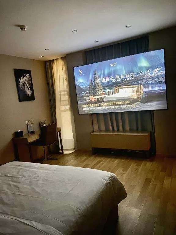 Bed in Echarm Hotel Wuhan Wusheng Road Metro Station Cade Square