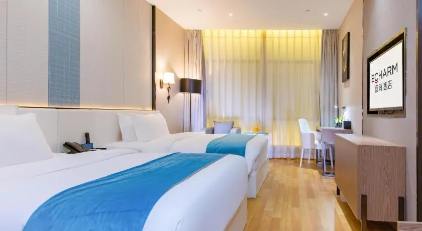Bed in Echarm Hotel Wuhan Wusheng Road Metro Station Cade Square