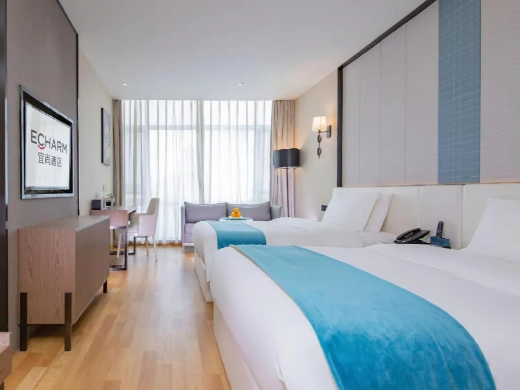 Bed in Echarm Hotel Wuhan Wusheng Road Metro Station Cade Square