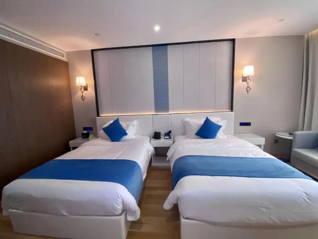 Bed in Echarm Hotel Wuhan Wusheng Road Metro Station Cade Square