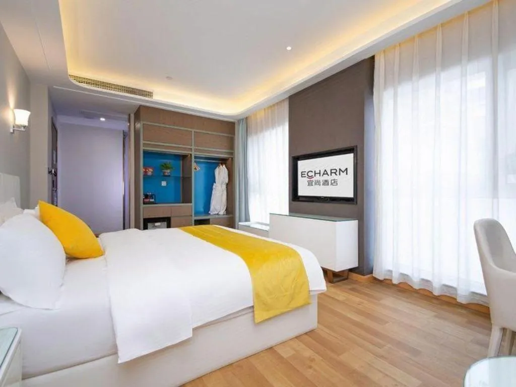 Bed in Echarm Hotel Wuhan Wusheng Road Metro Station Cade Square