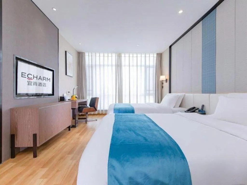 Bed in Echarm Hotel Wuhan Wusheng Road Metro Station Cade Square