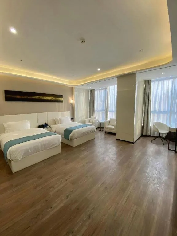 Bed in Echarm Hotel Wuhan Wusheng Road Metro Station Cade Square