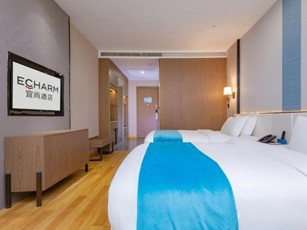 Bed in Echarm Hotel Wuhan Wusheng Road Metro Station Cade Square