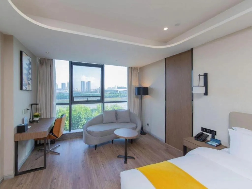 Bed in Echarm Hotel Wuhan Wusheng Road Metro Station Cade Square