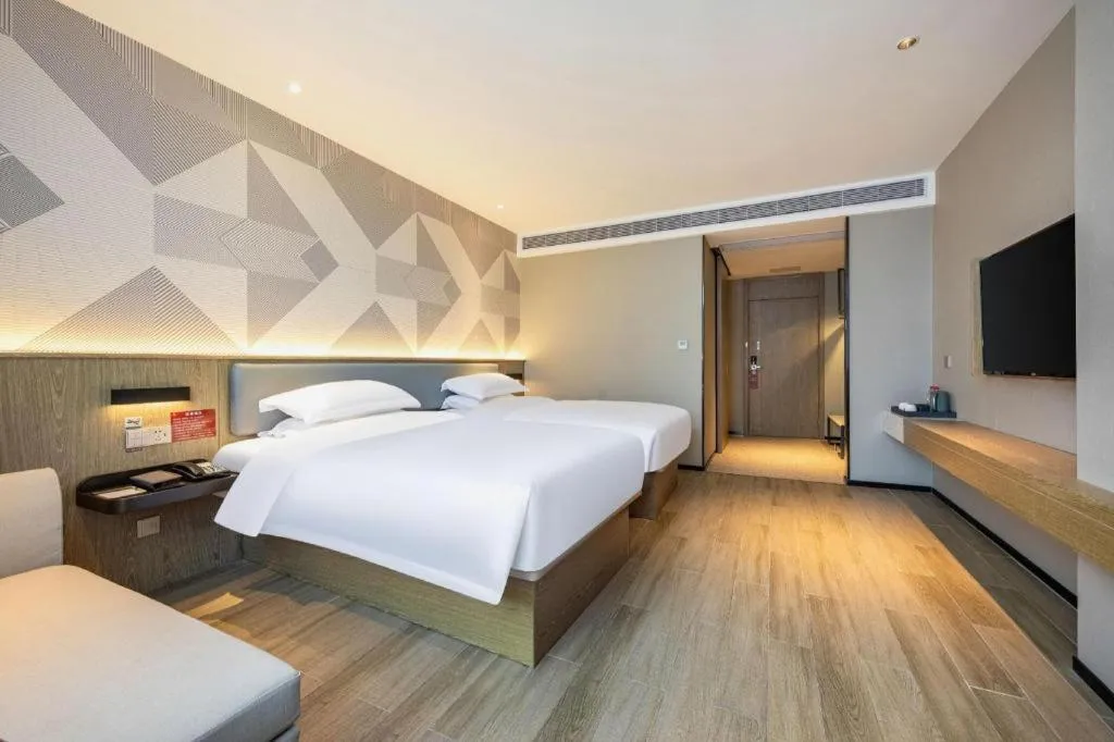Bed in Borrman Hotel Lianjiang Avenue Xinyuan International Plaza