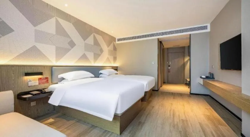Bed in Borrman Hotel Lianjiang Avenue Xinyuan International Plaza
