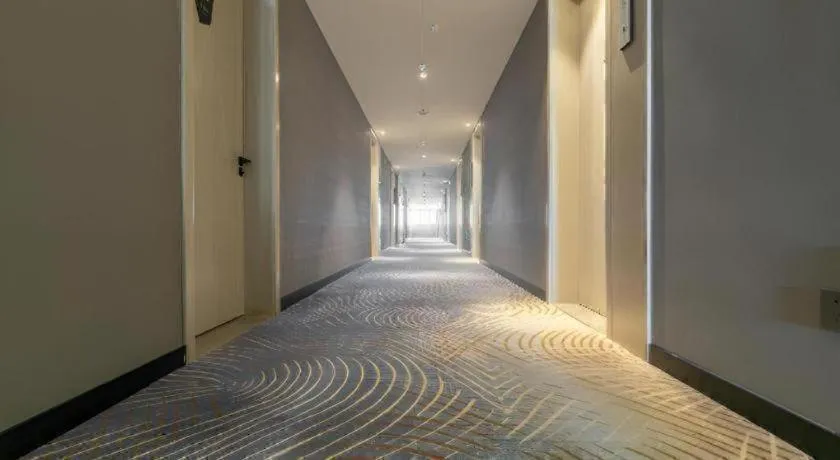 Bed in Echarm Hotel Yantai Wuzhou International