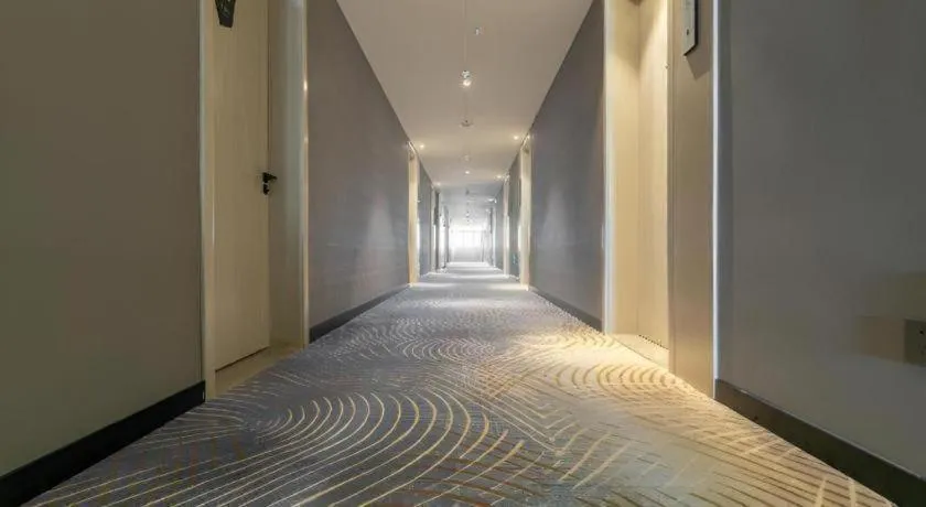 Bed in Echarm Hotel Yantai Wuzhou International