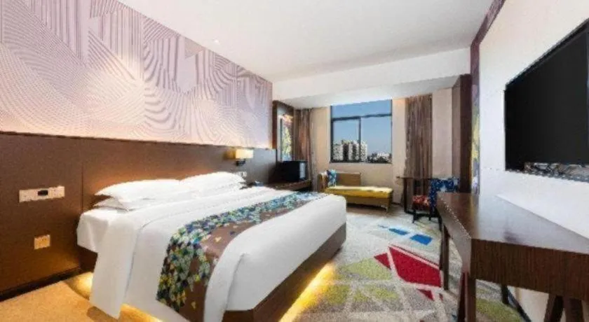 Bed in Borrman Hotel Wuhan Hankou Railway Station Metro Station