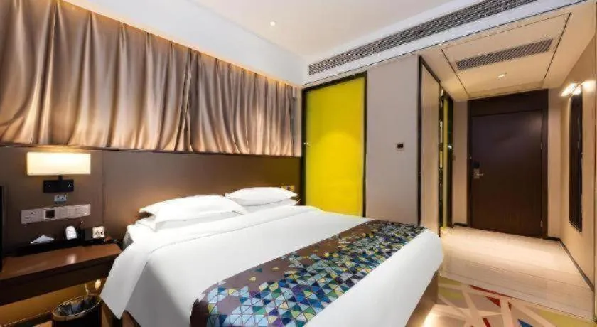 Bed in Borrman Hotel Wuhan Hankou Railway Station Metro Station