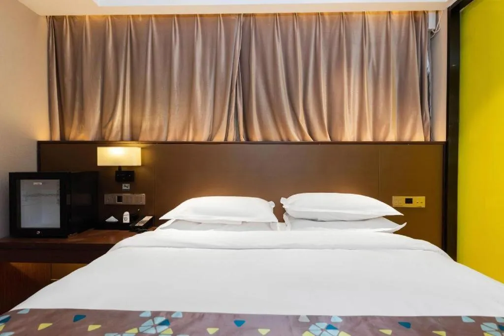 Bed in Borrman Hotel Wuhan Hankou Railway Station Metro Station