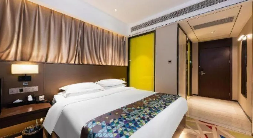 Bed in Borrman Hotel Wuhan Hankou Railway Station Metro Station