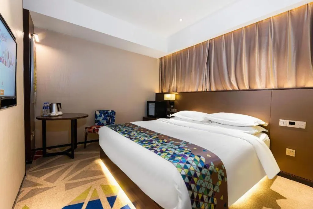 Bed in Borrman Hotel Wuhan Hankou Railway Station Metro Station