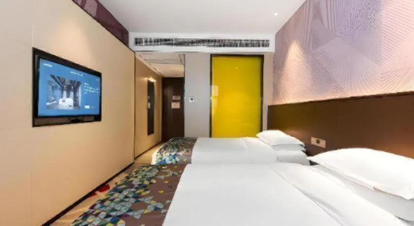 Bed in Borrman Hotel Wuhan Hankou Railway Station Metro Station