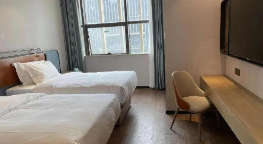 Bed in Echarm Hotel Nanjing Expo Center Olympic East Metro Station