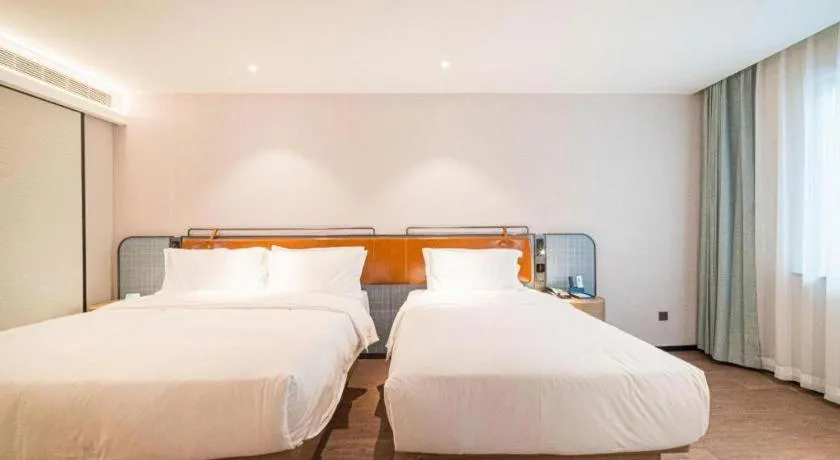 Bed in Echarm Hotel Nanjing Expo Center Olympic East Metro Station