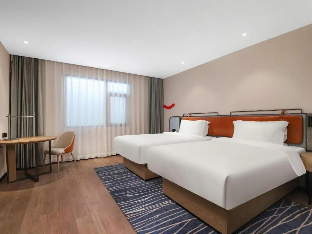 Bed in Echarm Hotel Nanjing Expo Center Olympic East Metro Station