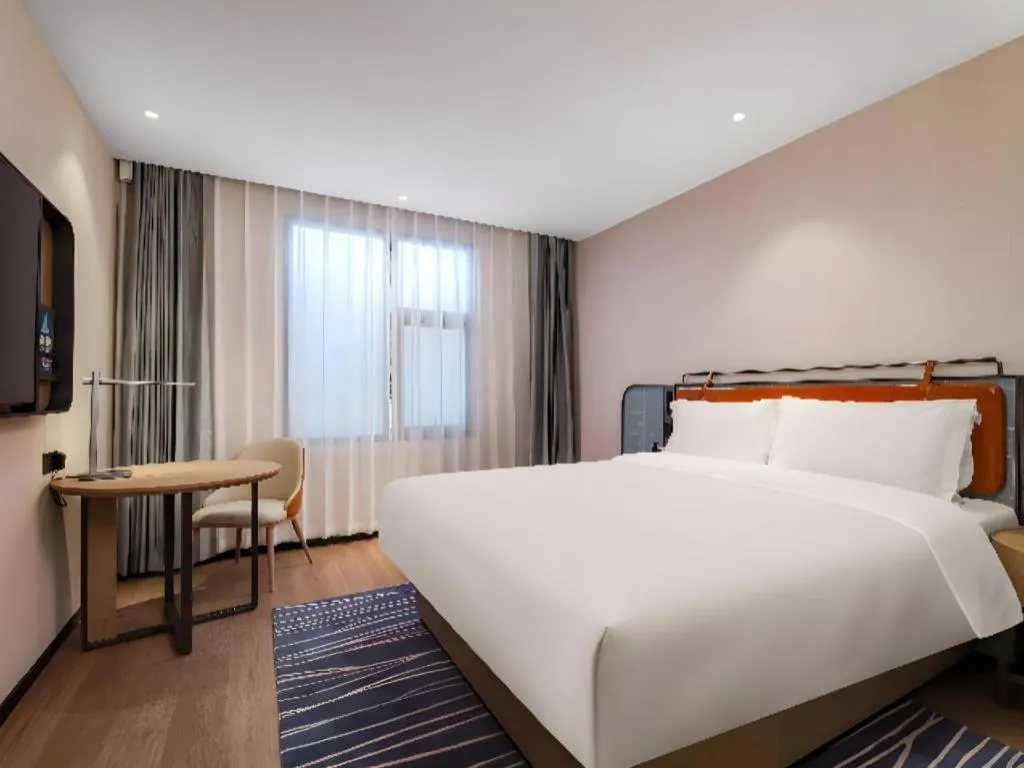 Bed in Echarm Hotel Nanjing Expo Center Olympic East Metro Station