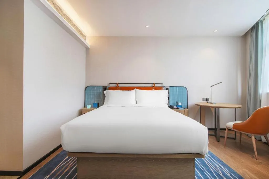 Bed in Echarm Hotel Nanjing Expo Center Olympic East Metro Station