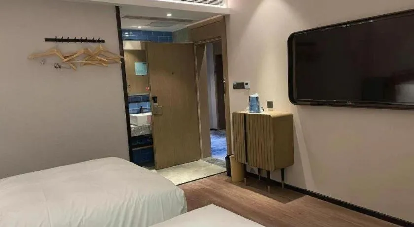 Bed in Echarm Hotel Nanjing Expo Center Olympic East Metro Station