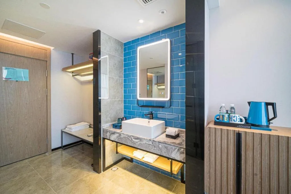 Bed in Echarm Hotel Nanjing Expo Center Olympic East Metro Station