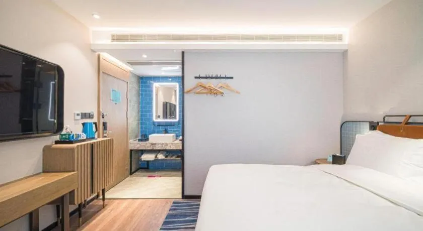 Bed in Echarm Hotel Nanjing Expo Center Olympic East Metro Station