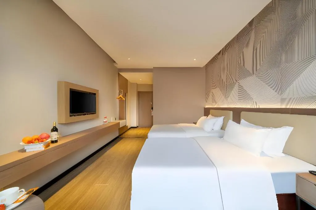 Bed in Borrman Hotel Xiantao Wushang Gymnasium