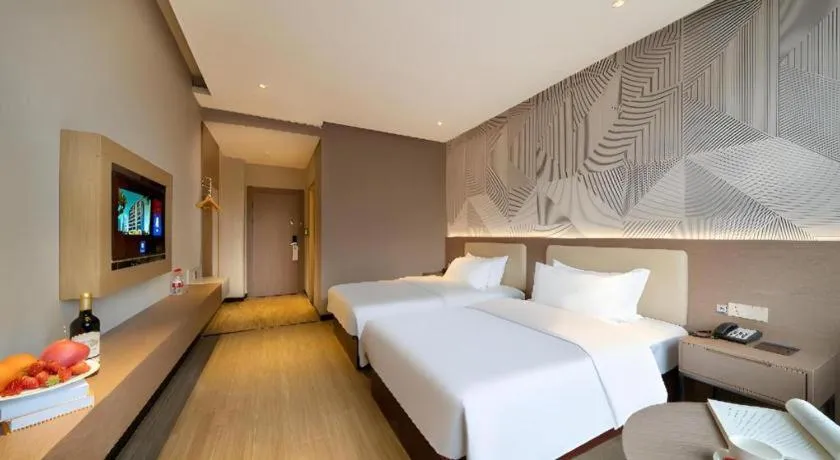 Bed in Borrman Hotel Xiantao Wushang Gymnasium