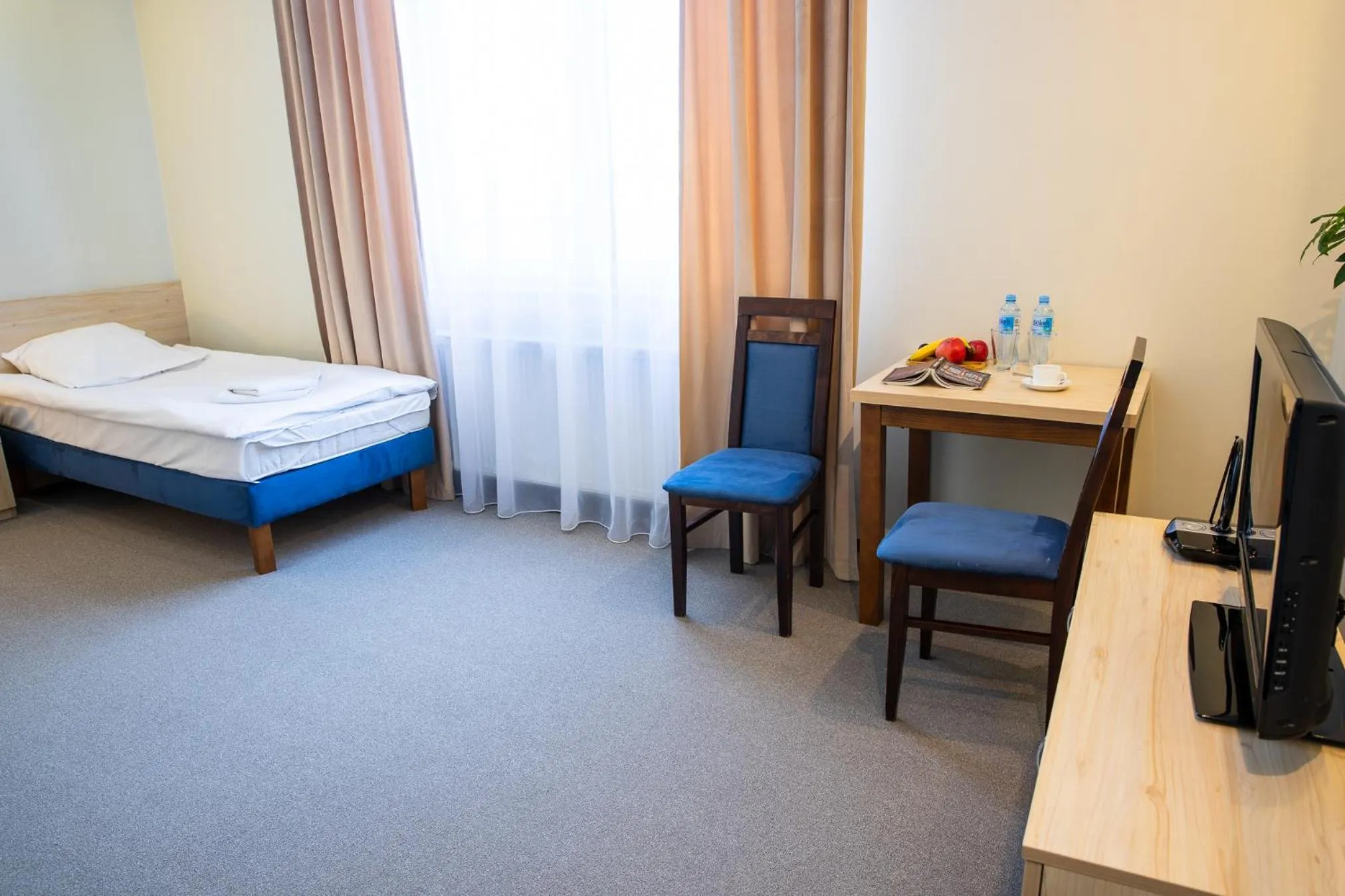 Bed in Hotel Kardamon