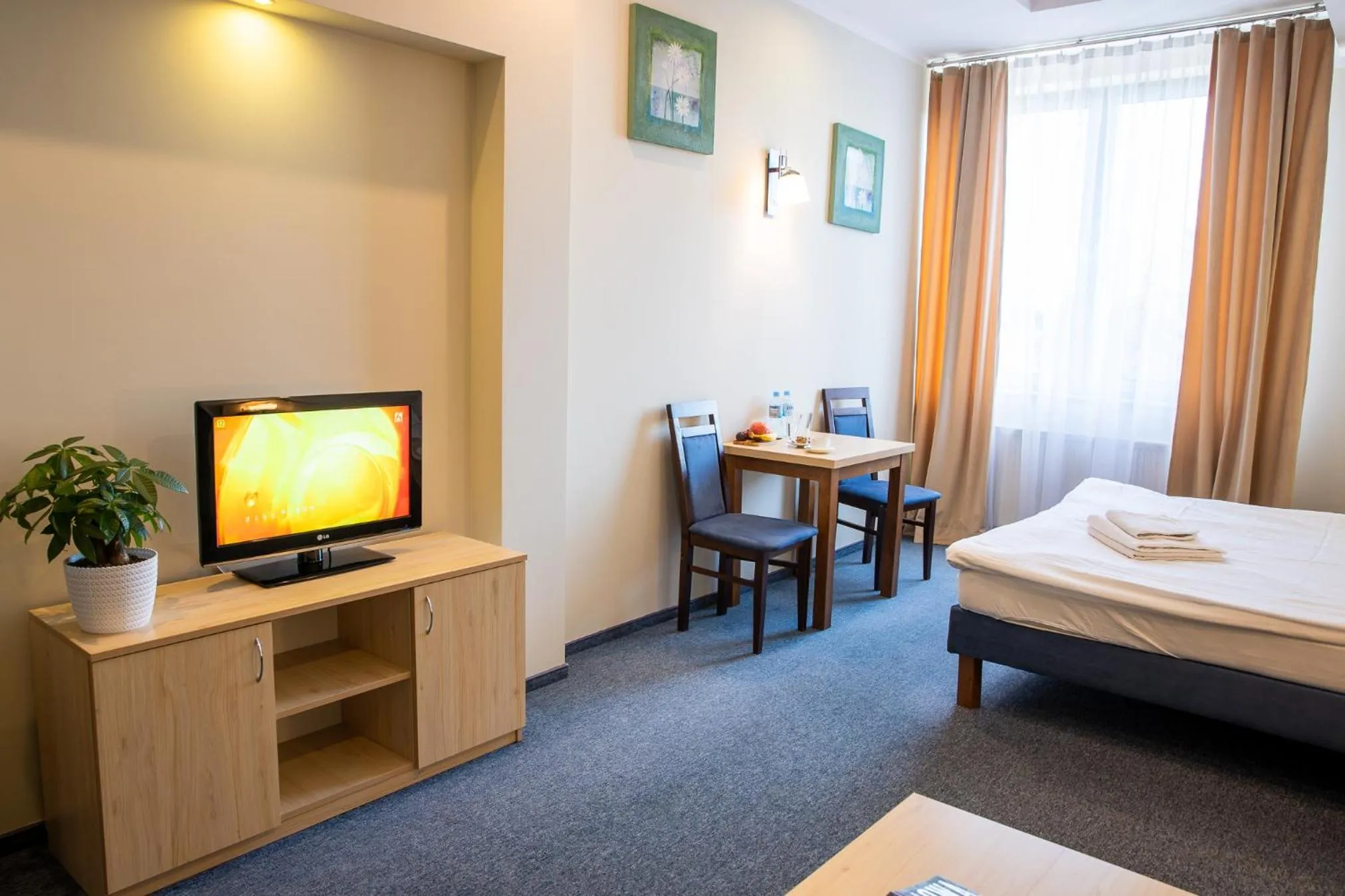 Bed in Hotel Kardamon