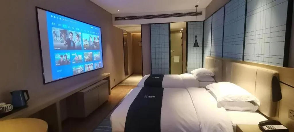 Bed in Echarm Hotel Wuhan Huashan