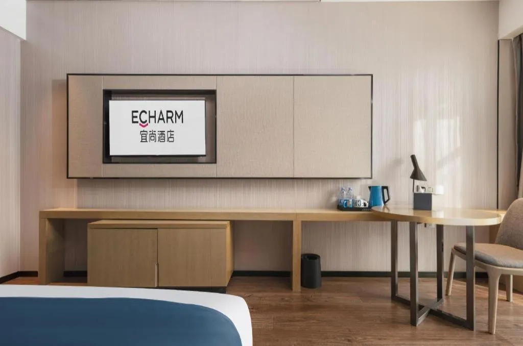 Bed in Echarm Hotel Wuhan Huashan