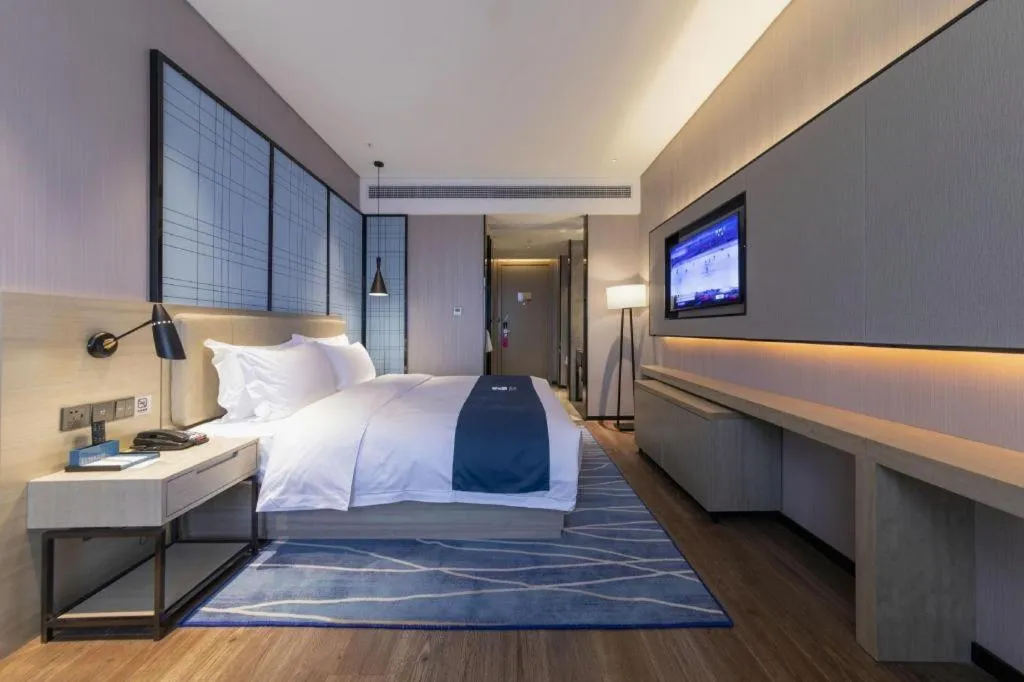 Bed in Echarm Hotel Wuhan Huashan