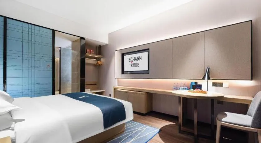 Bed in Echarm Hotel Wuhan Huashan