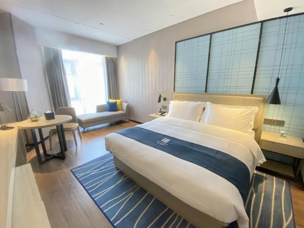 Bed in Echarm Hotel Wuhan Huashan