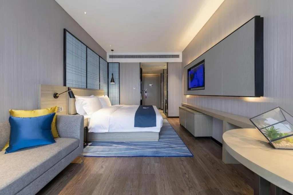 Bed in Echarm Hotel Wuhan Huashan