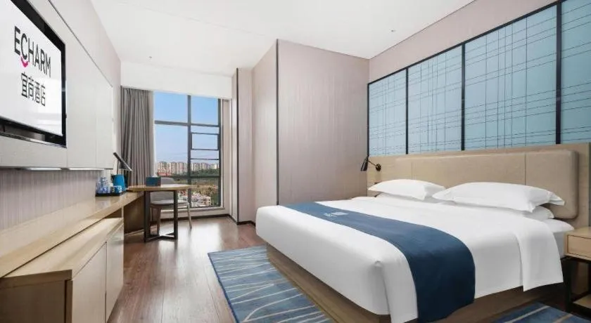 Bed in Echarm Hotel Wuhan Huashan