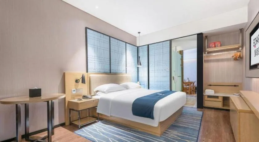Bed in Echarm Hotel Wuhan Huashan