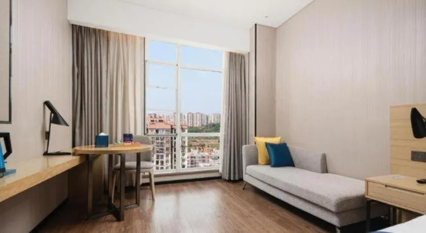 Bed in Echarm Hotel Wuhan Huashan