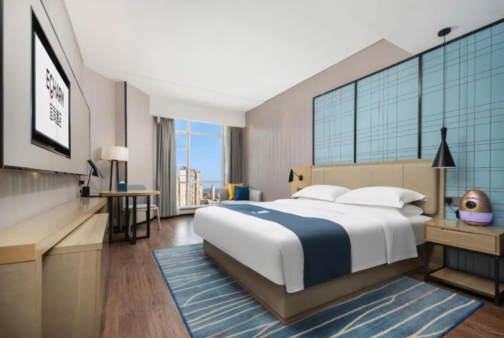 Bed in Echarm Hotel Wuhan Huashan