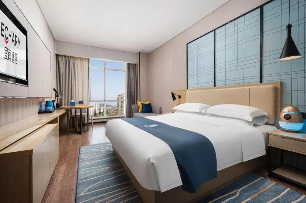 Bed in Echarm Hotel Wuhan Huashan