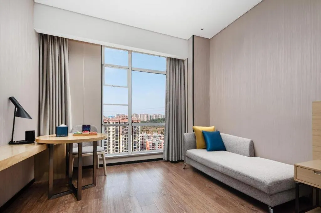 Bed in Echarm Hotel Wuhan Huashan