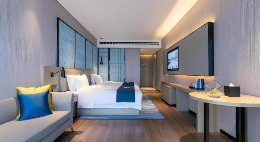 Bed in Echarm Hotel Wuhan Huashan