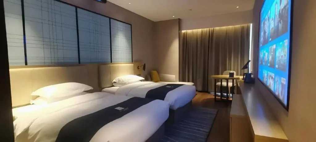 Bed in Echarm Hotel Wuhan Huashan