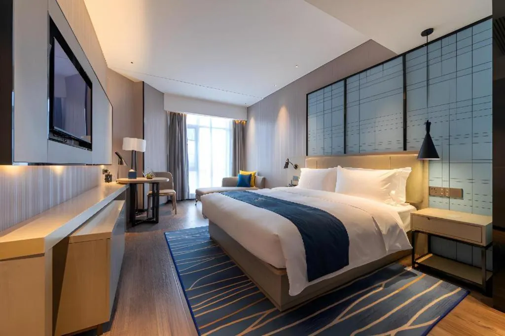 Bed in Echarm Hotel Wuhan Huashan