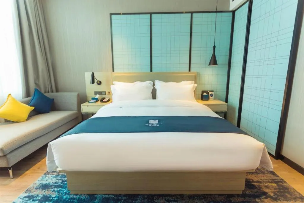 Bed in Echarm Hotel Wuhan Huashan
