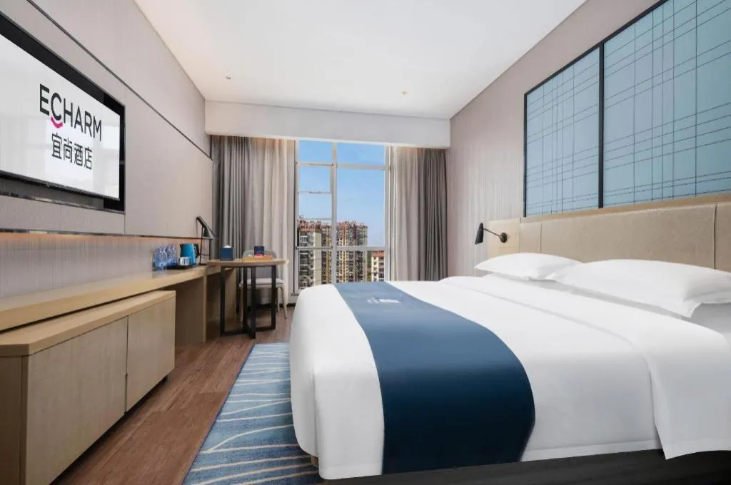 Bed in Echarm Hotel Wuhan Huashan