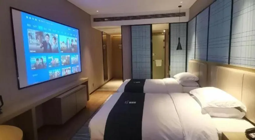 Bed in Echarm Hotel Wuhan Huashan